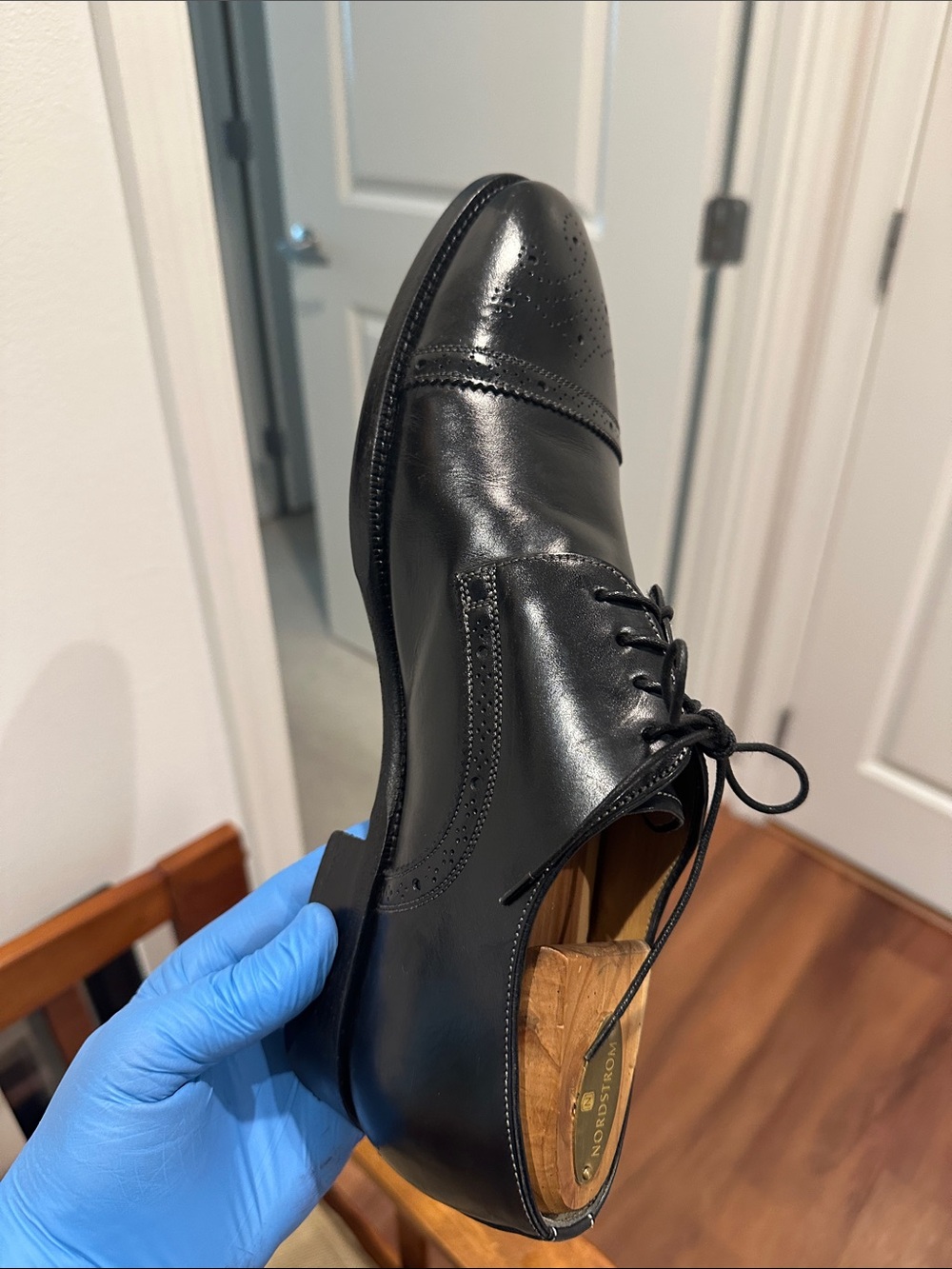 Santoni dress shoes feature a distinct toe medallion. - Picture 9 of 14